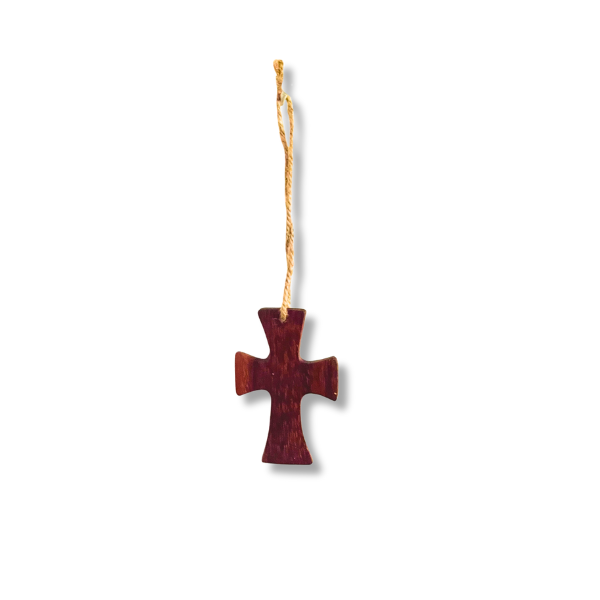 picture of a cross ornament made from mugavu wood