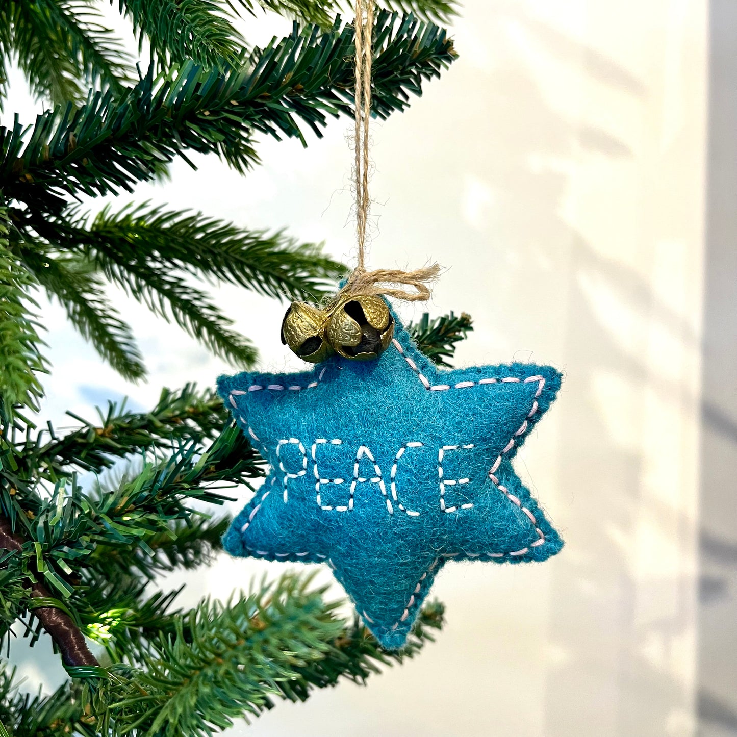 handcrafted felt peace ornament