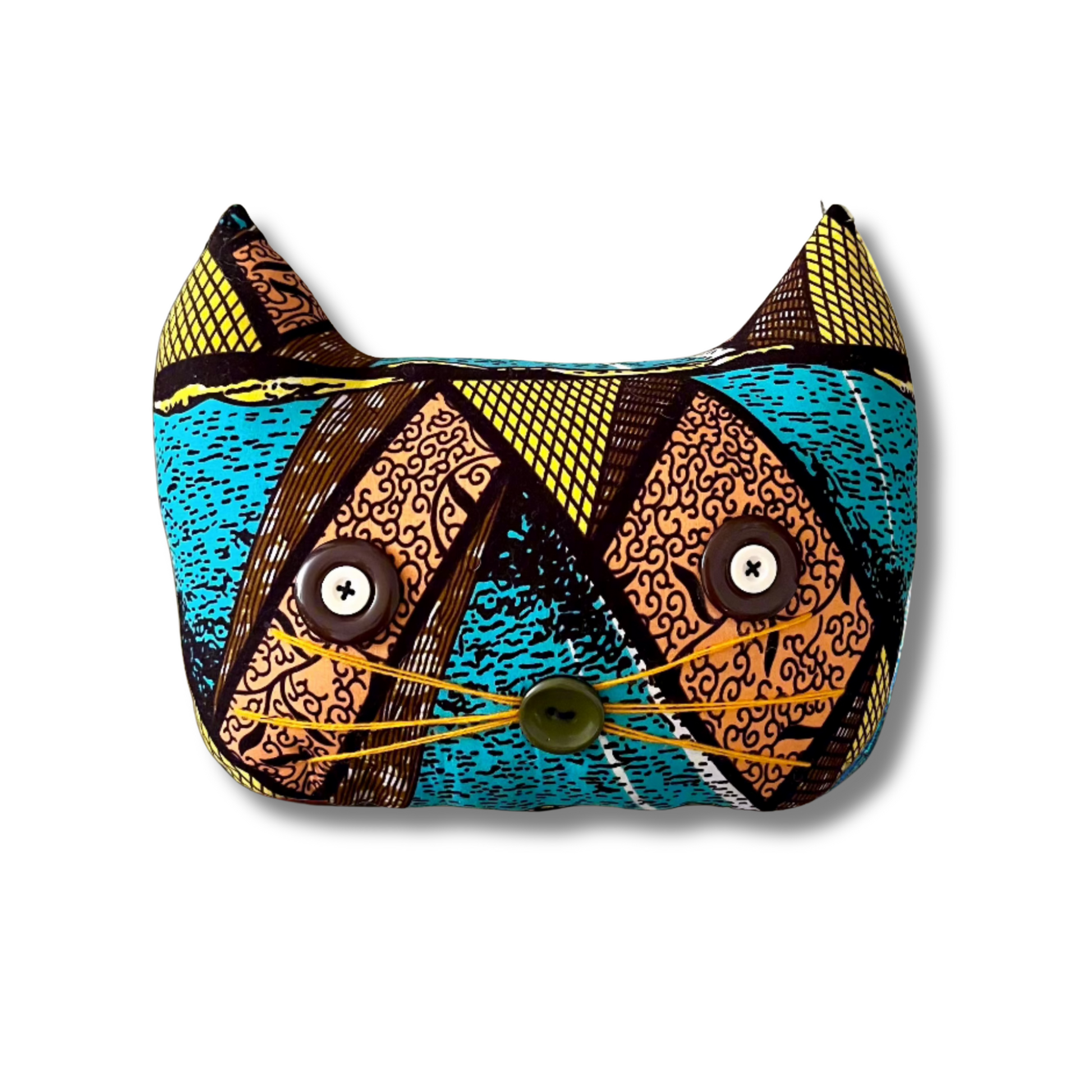 a picture of a pillow shaped like a cat's face in a bold kitenge fabric