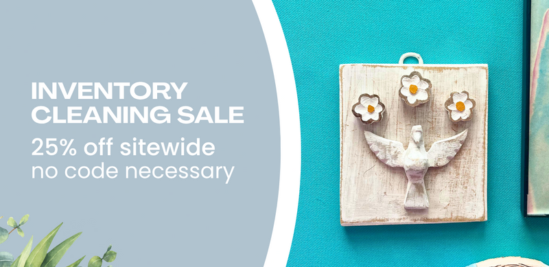 Promotional banner for an inventory cleaning sale, featuring white text on a light blue-gray background and a turquoise side panel showing a decorative white bird wall hanging with flower accents.