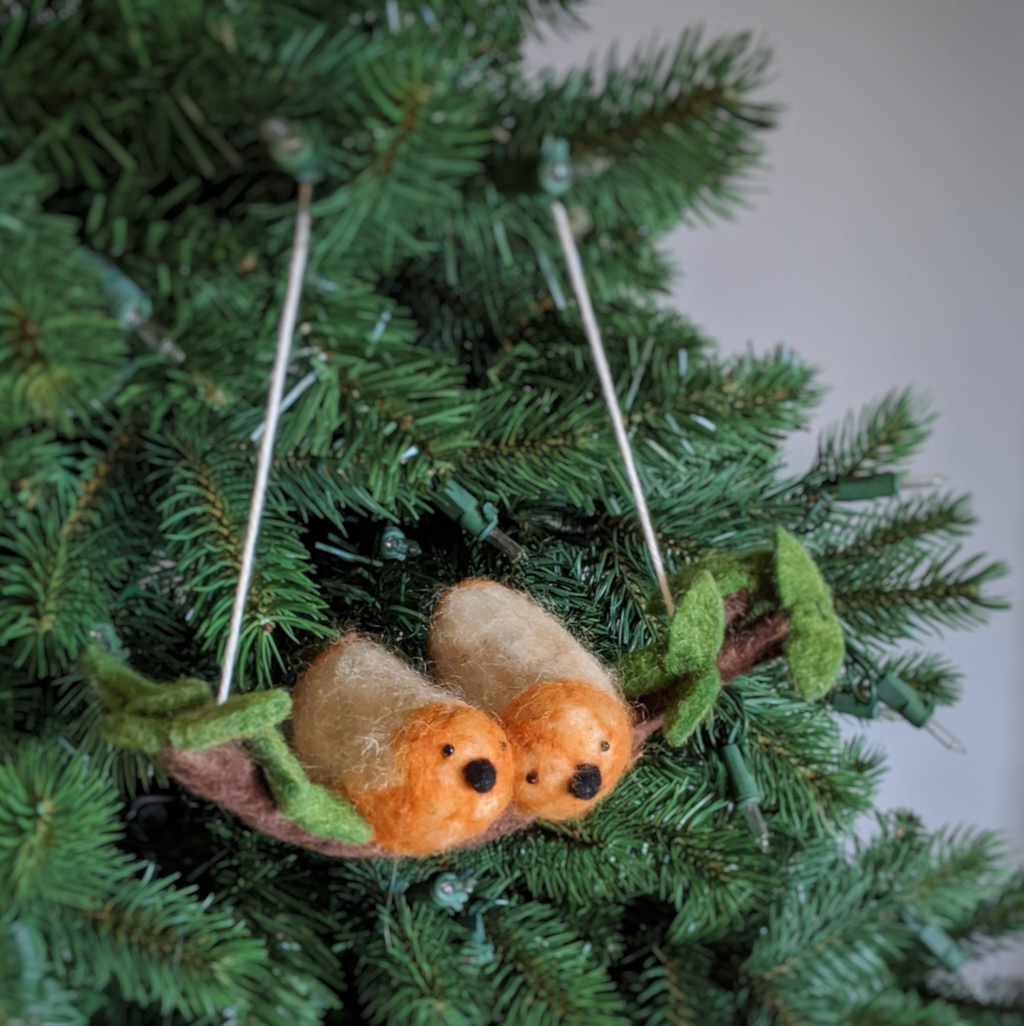 handcrafted felt lovebirds on a branch ornament